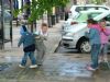 Young ones enjoy the music and the rain